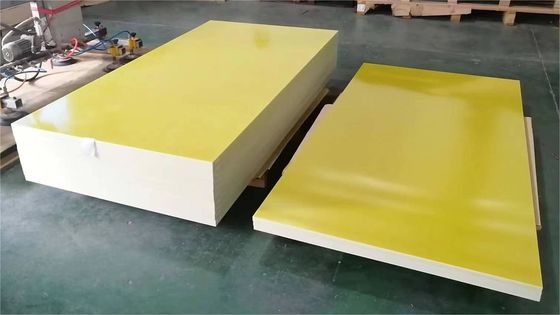 Tablero de aislamiento eléctrico amarillo con permittividad relativa de 50 Hz ≤5,5 y tensión de ruptura paralela a las laminaciones a 90C ± 2C en aceite ≥35kV
